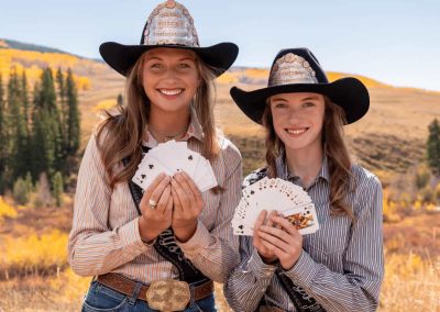 Cattlemen's Days Royalty with poker cards.