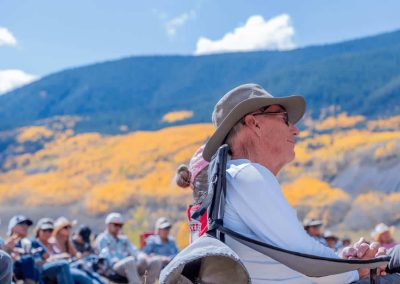 Audience enjoying the music, beautiful weather, and good food.